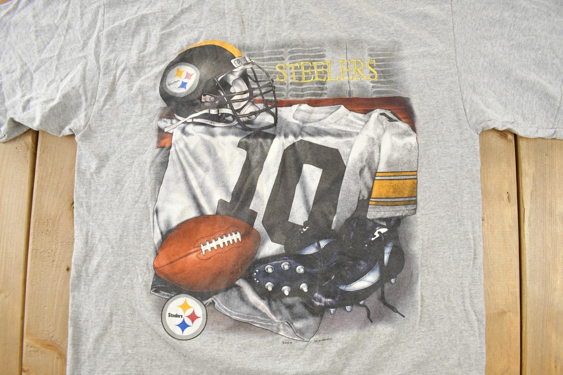 Vintage 1990s Pittsburgh Steelers NFL Graphic T-Shirt Men's XL from propervintagecanada