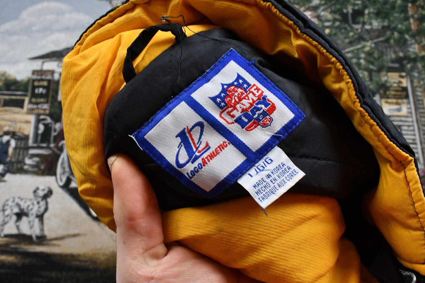 Vintage 1990s Pittsburgh Steelers NFL Logo Athletic Puffer Jacket Men's Large from propervintagecanada