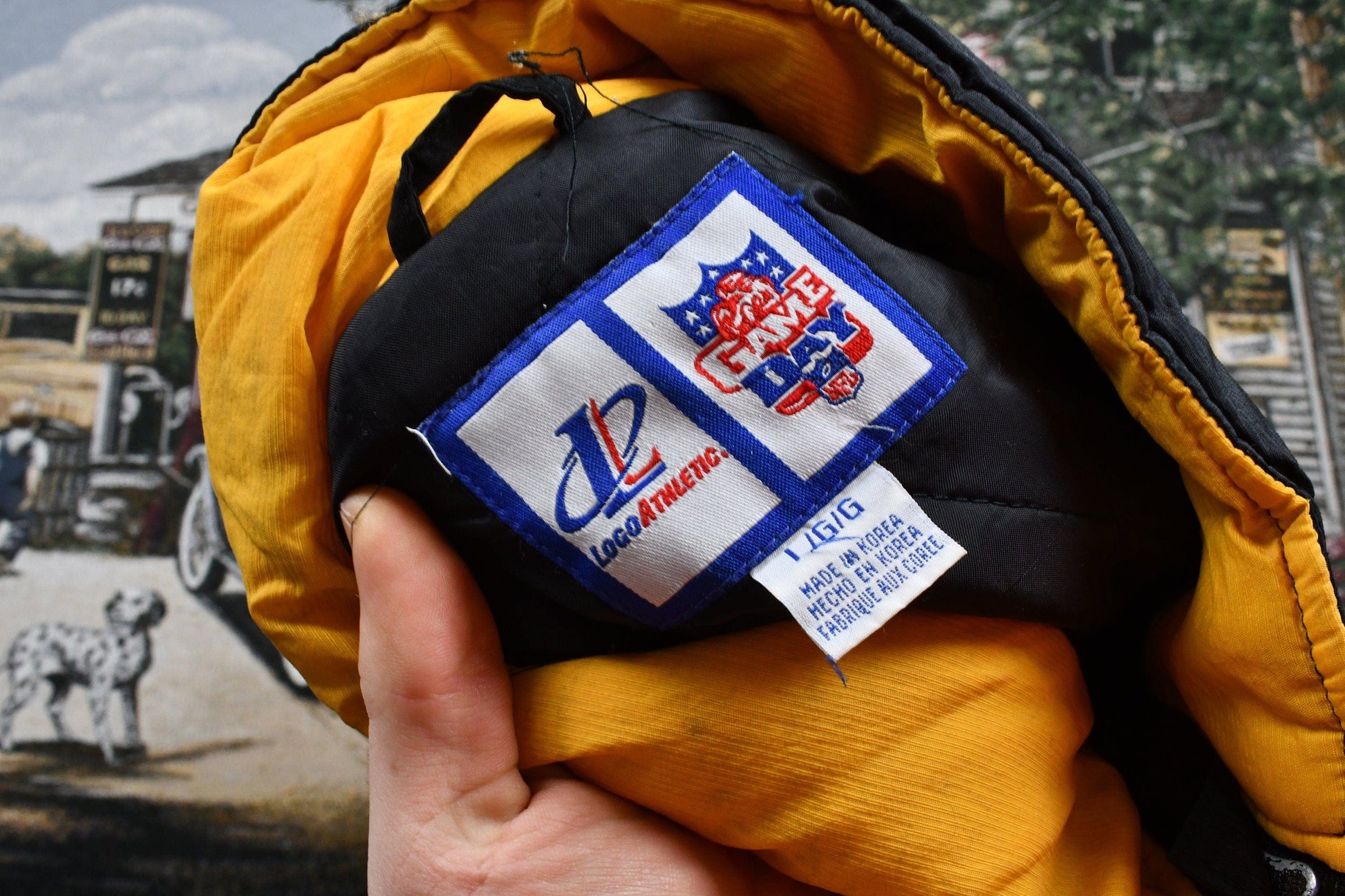 Vintage 1990s Pittsburgh Steelers NFL Logo Athletic Puffer Jacket Men's Large from propervintagecanada