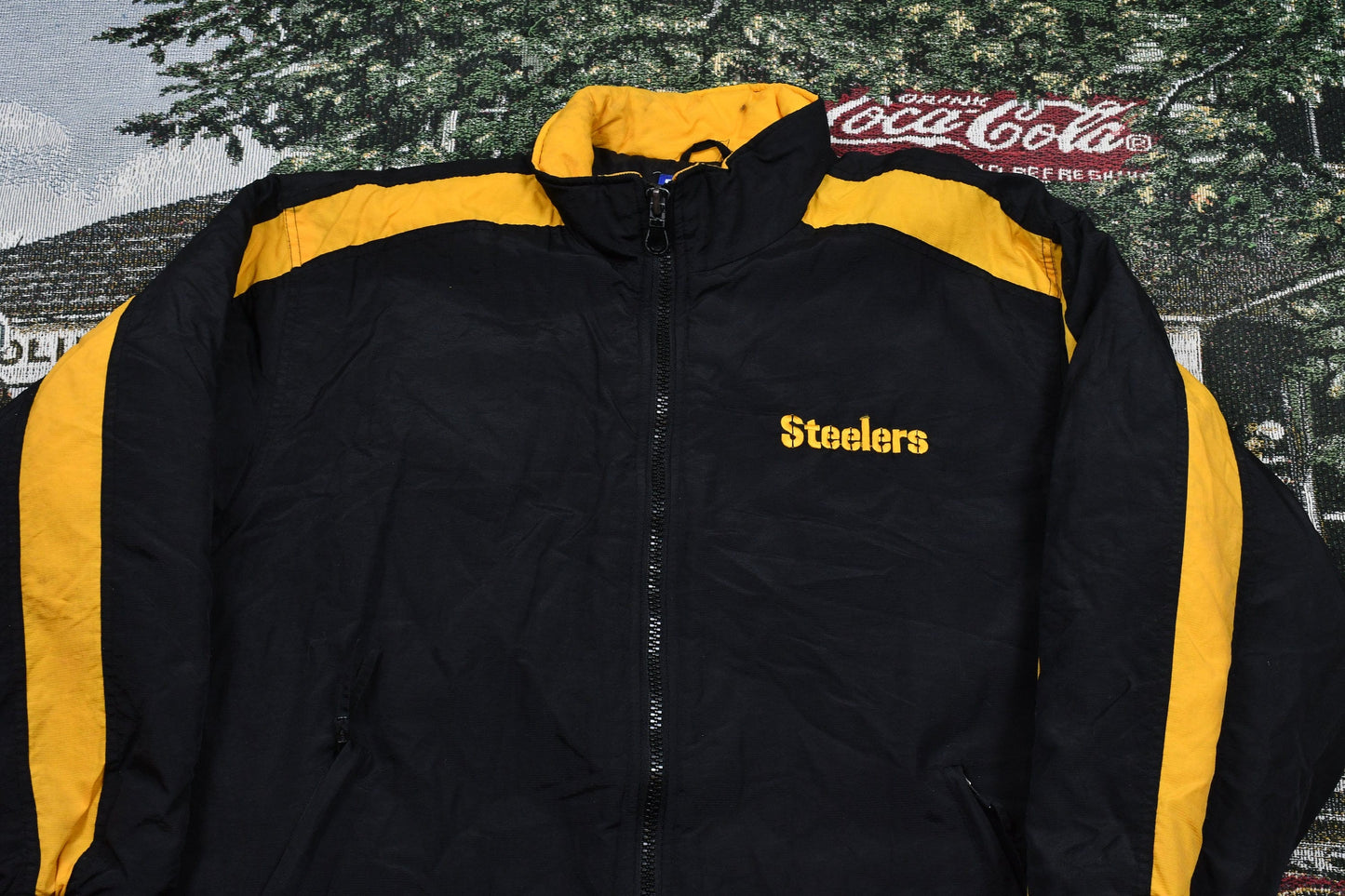 Vintage 1990s Pittsburgh Steelers NFL Logo Athletic Puffer Jacket Men's Large from propervintagecanada