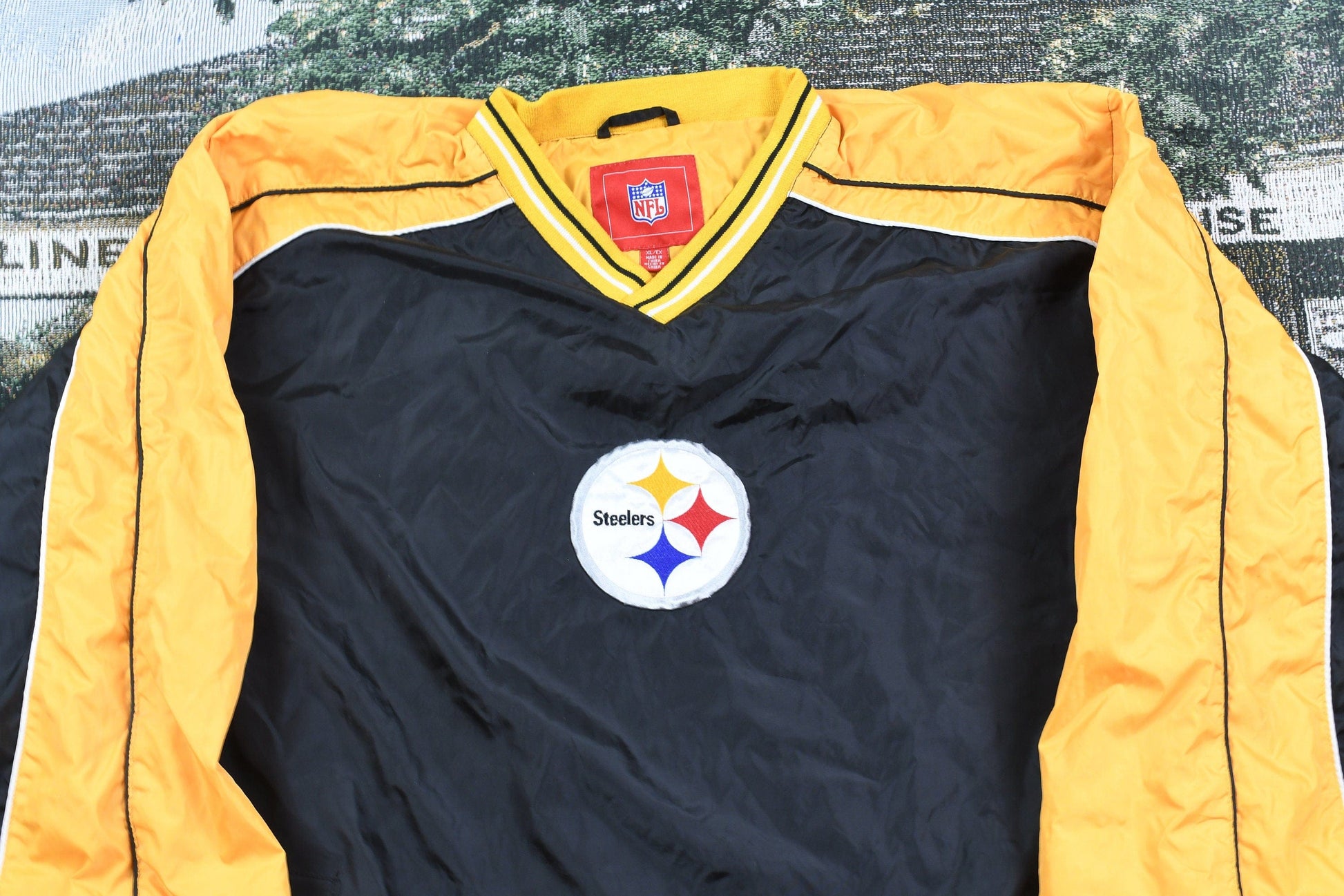 Vintage 1990s Pittsburgh Steelers NFL Pullover Windbreaker Men's XL from propervintagecanada