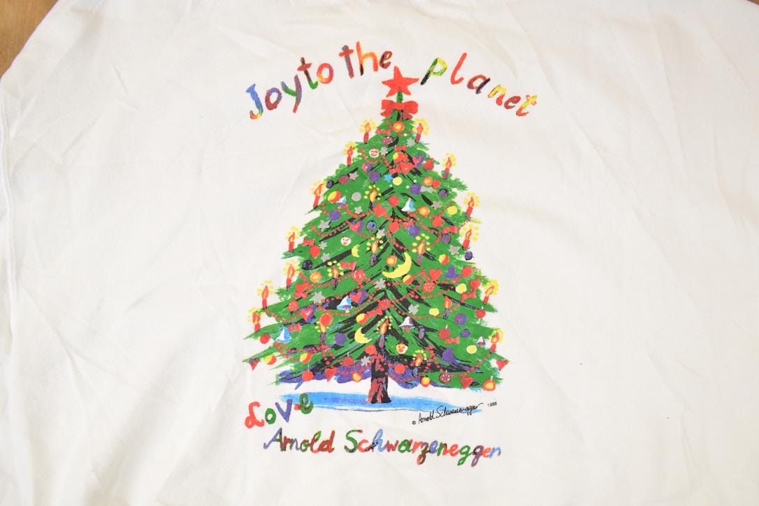 Vintage 1990s Planet Hollywood Arnold Schwarzenegger Graphic Print Christmas Tree Crewneck Sweatshirt Mens XL from propervintagecanada