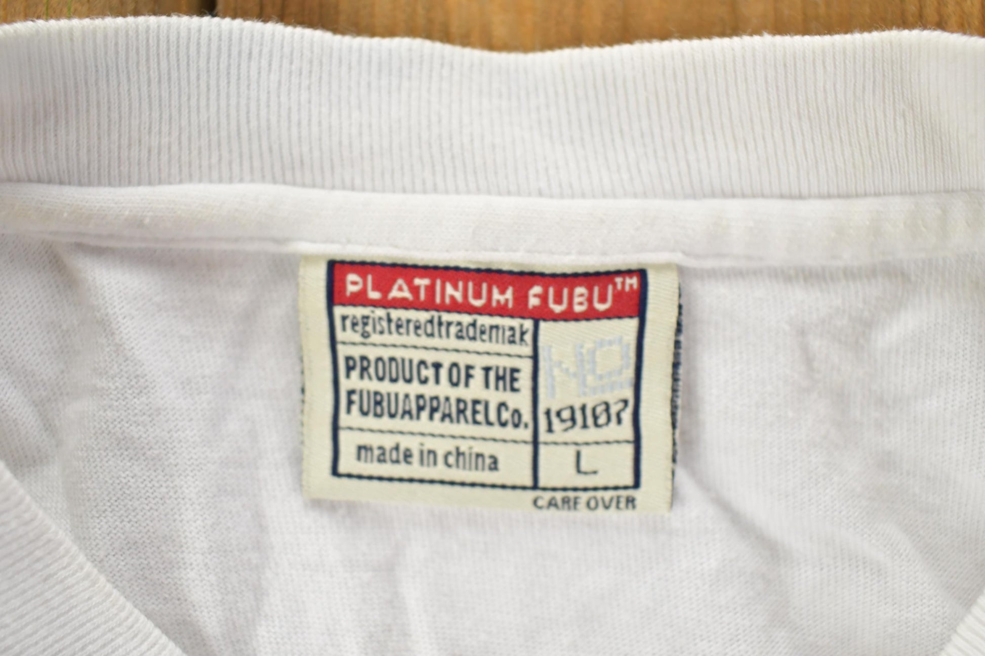 Vintage 1990s PLATINUM FUBU Graphic T-Shirt Men's Large from propervintagecanada