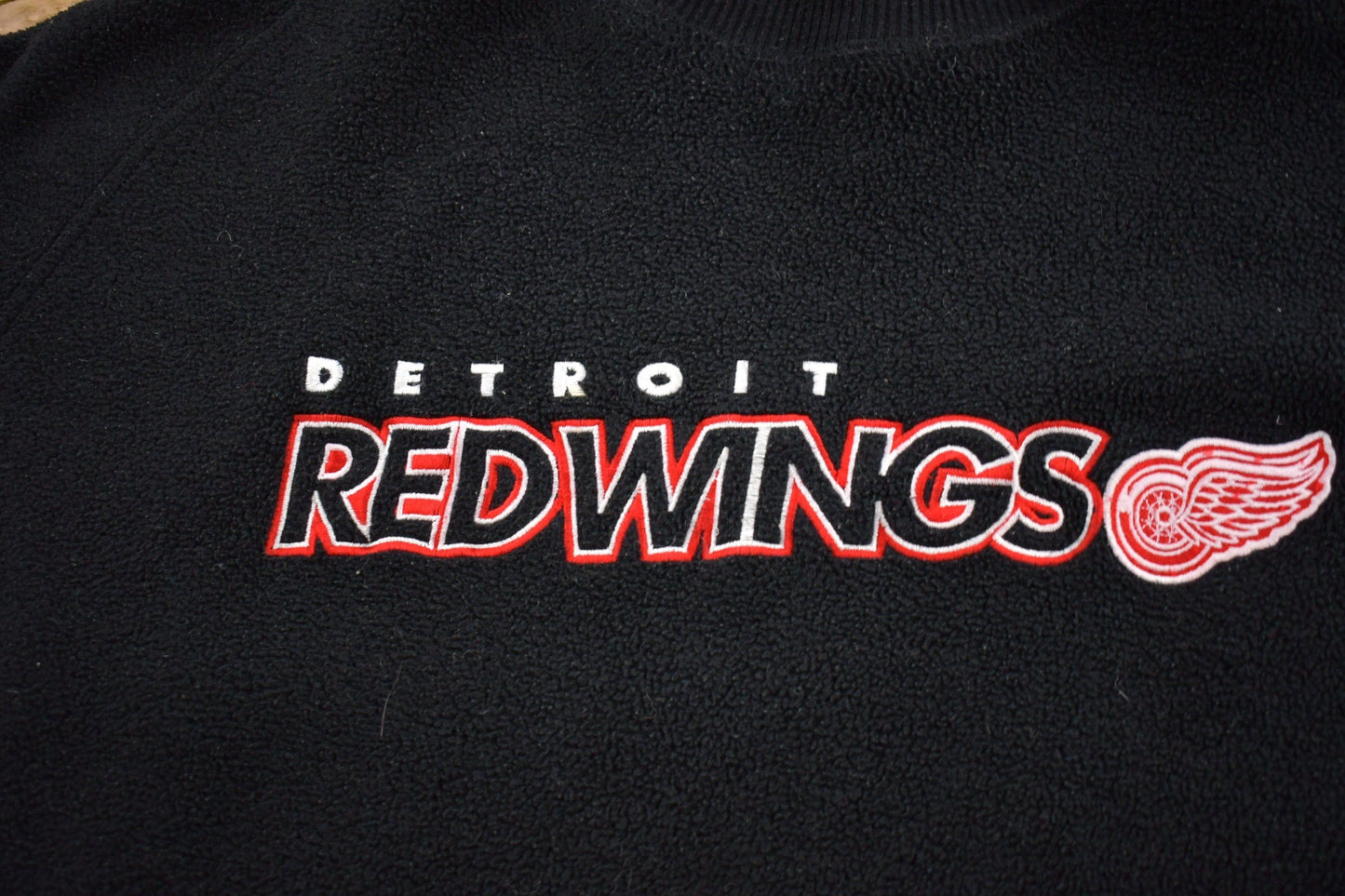 Vintage 1990s Pro Edge Detroit Red Wings NHL Embroidered Fleece Sweater Men's 2XL from propervintagecanada