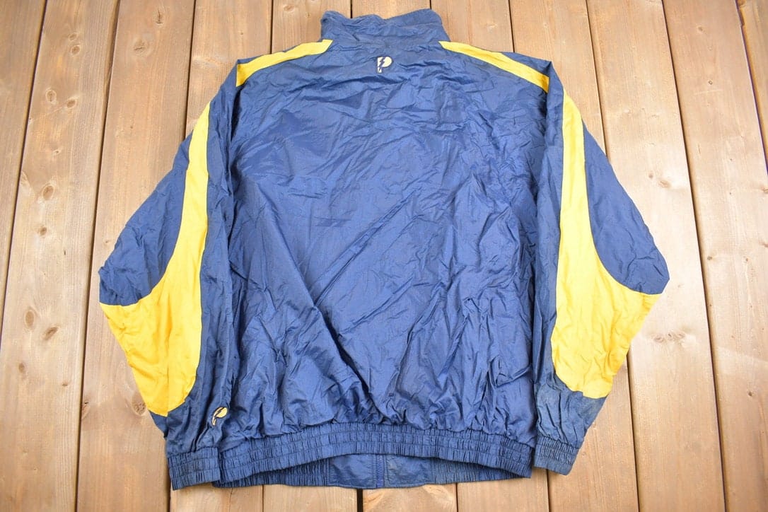 Vintage 1990s Pro Player Indiana Pacers NBA Windbreaker Jacket Men's XL from propervintagecanada