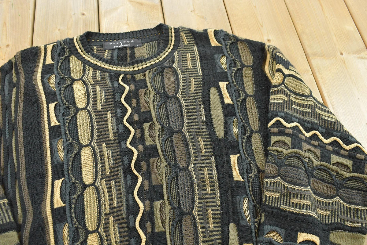 Vintage 1990s Protégé 3D Cable Knit Crewneck Sweater Men's L from propervintagecanada