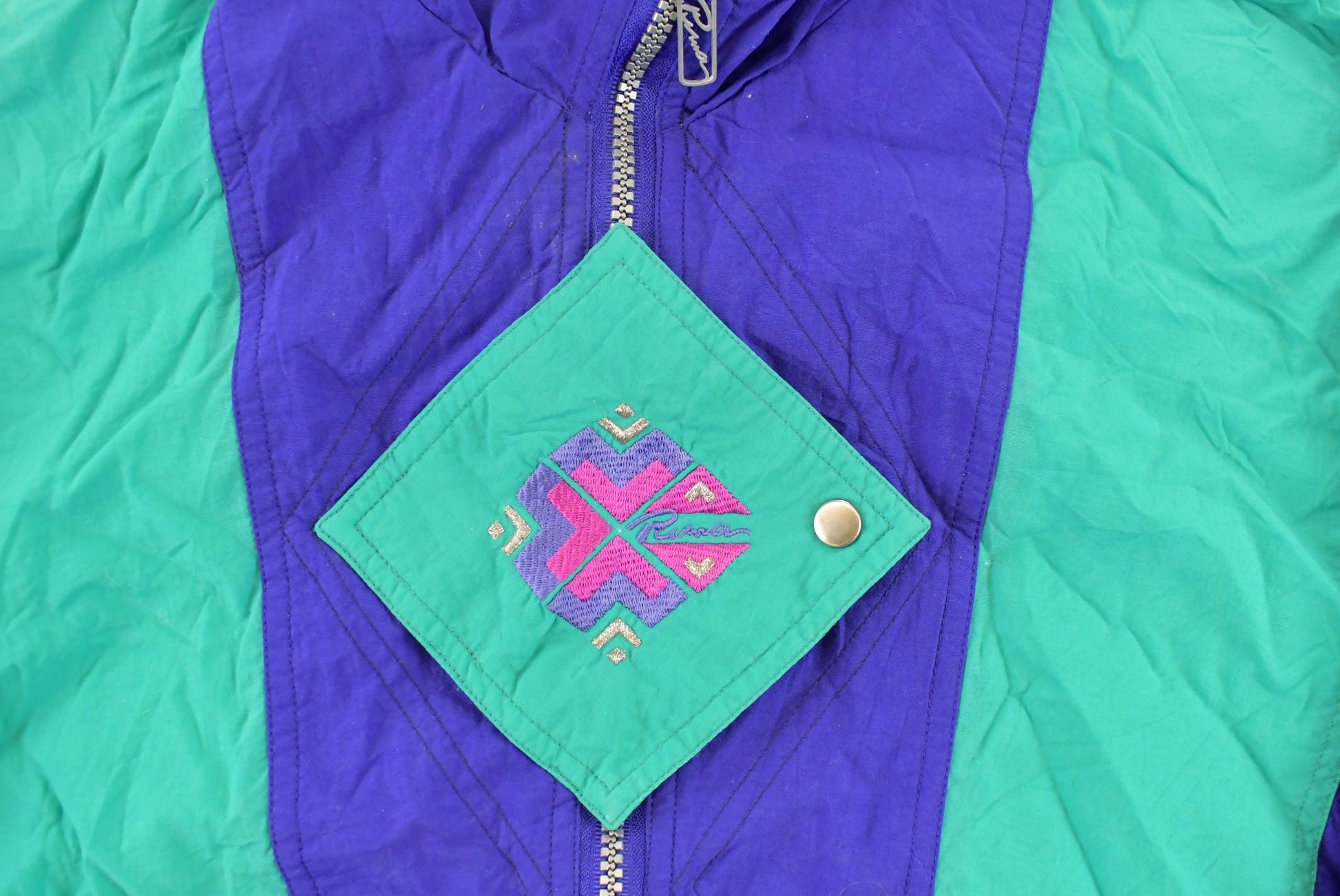 Vintage 1990s Puma Abstract Full Zip Windbreaker Jacket Women's Medium from propervintagecanada