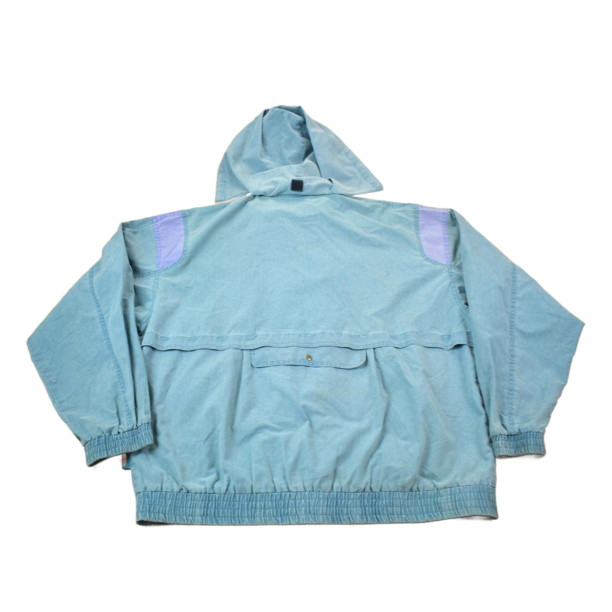 Vintage 1990s Puma Embroidered Sun Faded Windbreaker Jacket Size XL Men's XL from propervintagecanada