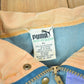 Vintage 1990s Puma Embroidered Sun Faded Windbreaker Jacket Size XL Men's XL from propervintagecanada