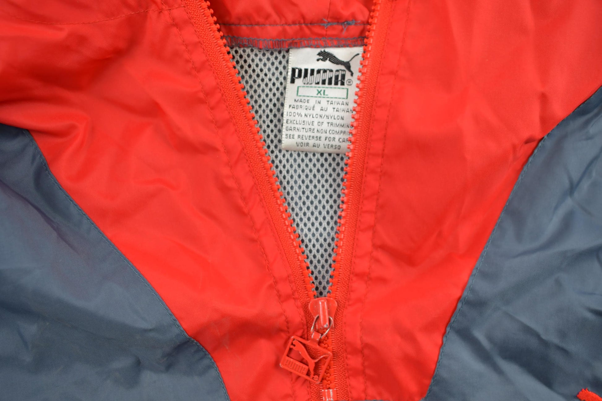 Vintage 1990s Puma Quarter Zip Windbreaker Jacket Men's XL from propervintagecanada