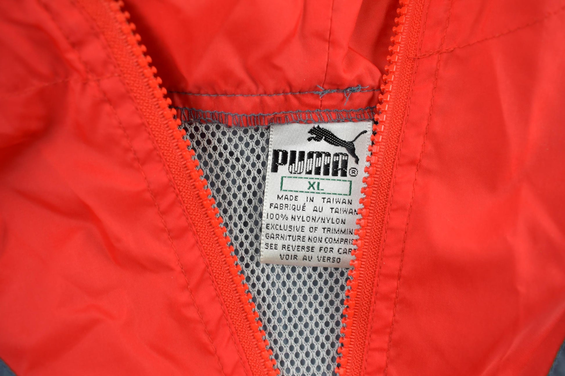 Vintage 1990s Puma Quarter Zip Windbreaker Jacket Men's XL from propervintagecanada
