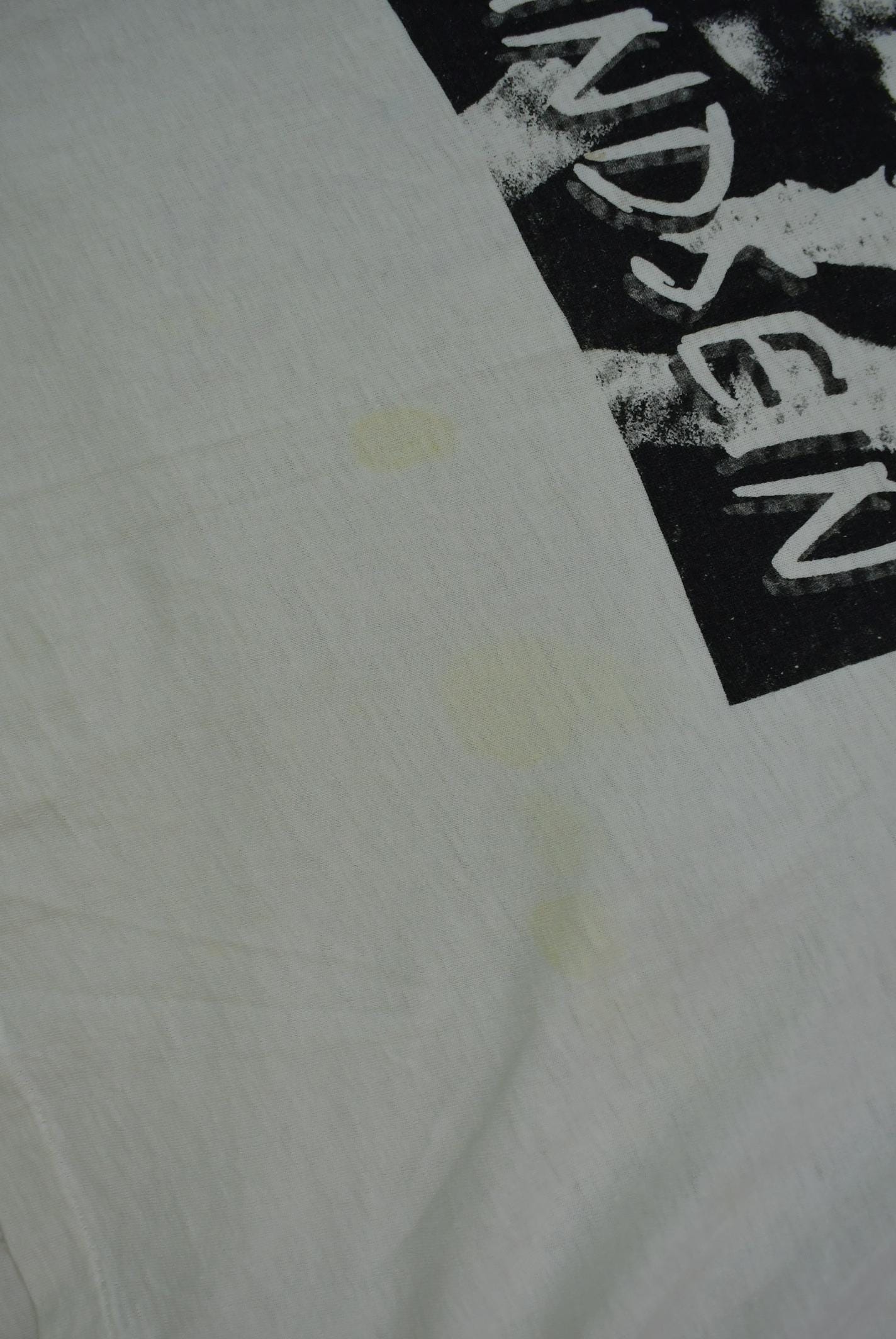 Vintage 1990s Querelle Kindsein Single Stitch Graphic Band Tee Men's Medium from propervintagecanada