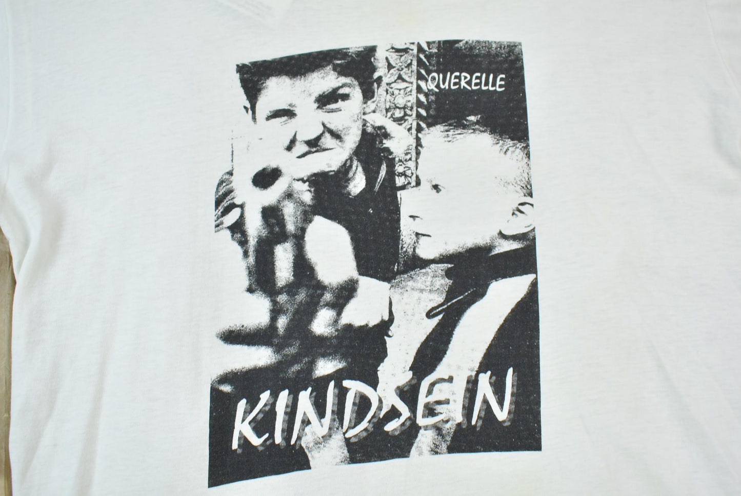 Vintage 1990s Querelle Kindsein Single Stitch Graphic Band Tee Men's Medium from propervintagecanada