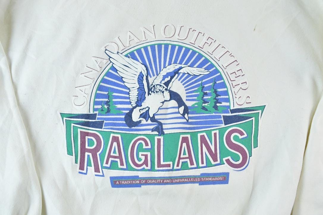 Vintage 1990s Raglans Outdoorsman Canadian Outfitters Crewneck Sweatshirt Men's M from propervintagecanada