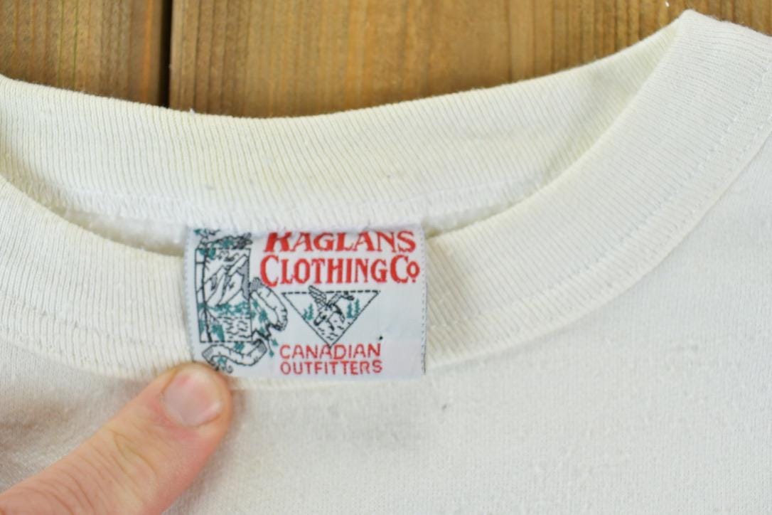 Vintage 1990s Raglans Outdoorsman Canadian Outfitters Crewneck Sweatshirt Men's M from propervintagecanada