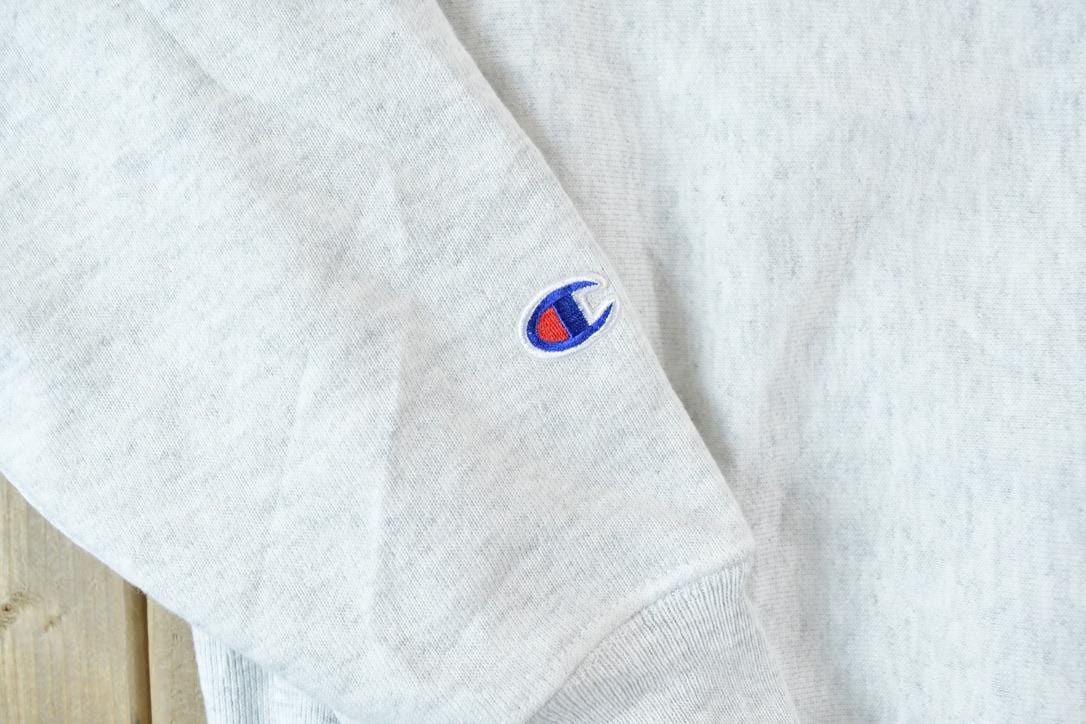 Vintage 1990s Rasmussen University Champion Reverse Weave Crewneck Sweatshirt Men's Large from propervintagecanada