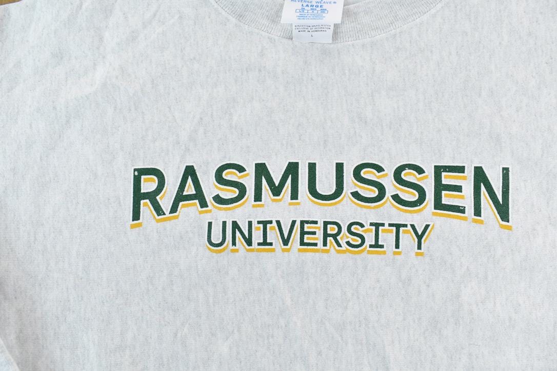 Vintage 1990s Rasmussen University Champion Reverse Weave Crewneck Sweatshirt Men's Large from propervintagecanada