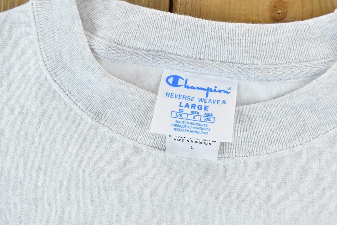 Vintage 1990s Rasmussen University Champion Reverse Weave Crewneck Sweatshirt Men's Large from propervintagecanada