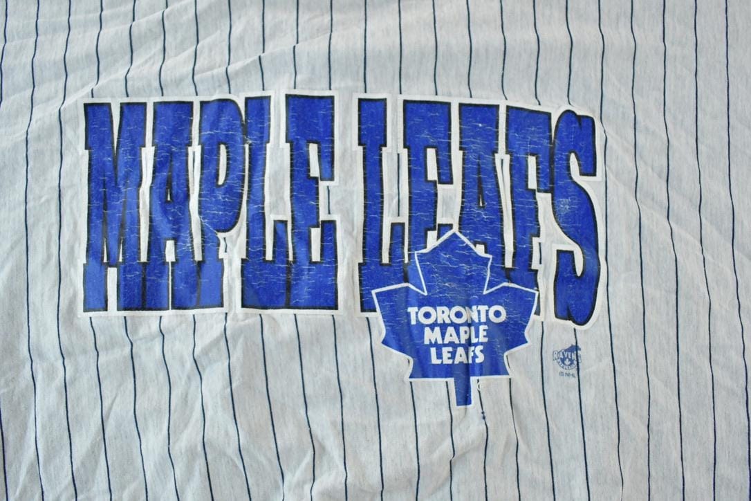 Vintage 1990s Ravens Toronto Maple Leafs NHL Graphic Sport Jersey Men's XL from propervintagecanada
