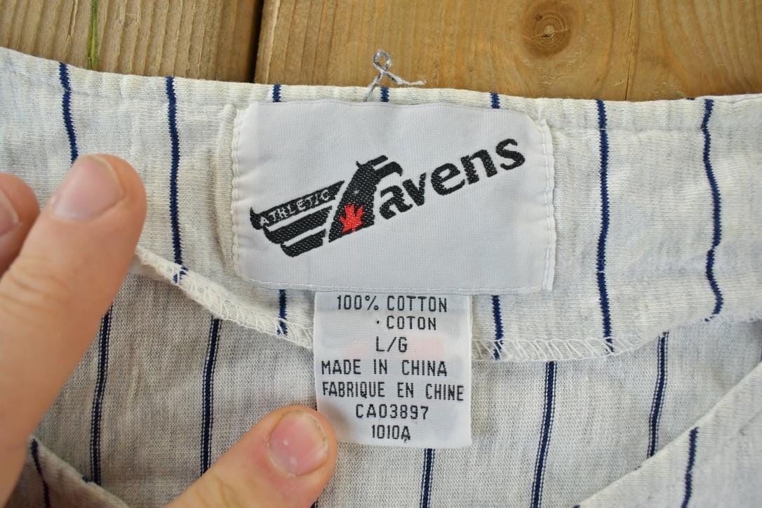 Vintage 1990s Ravens Toronto Maple Leafs NHL Graphic Sport Jersey Men's XL from propervintagecanada