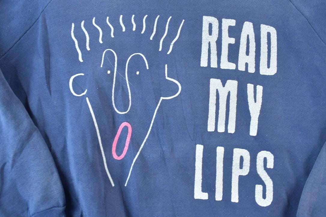 Vintage 1990s Read My Lips Noodle Hair Guy Crewneck Sweatshirt Men's XL from propervintagecanada