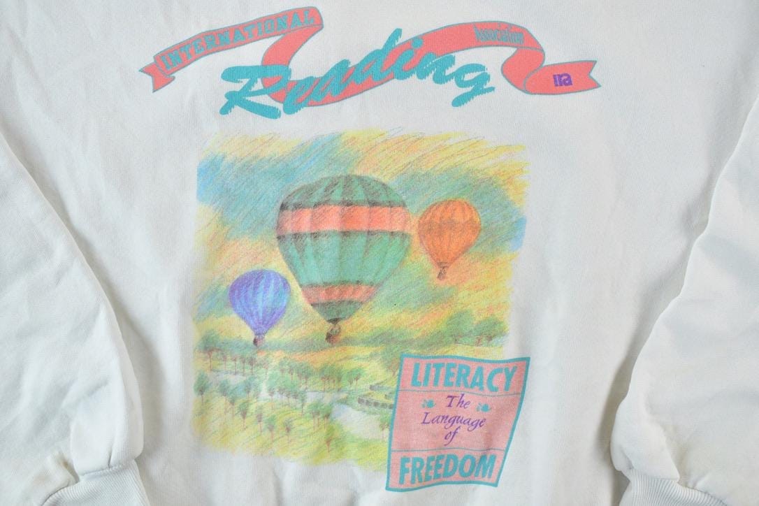 Vintage 1990s Reading Crewneck Sweatshirt Made In USA Men's XL from propervintagecanada