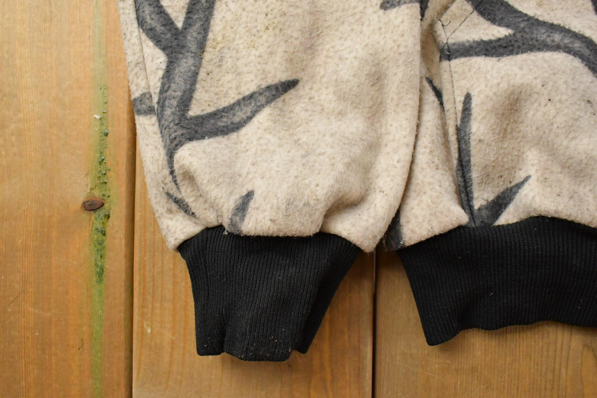 Vintage 1990s Real Tree Camo Fleece Sweater Men's Large from propervintagecanada