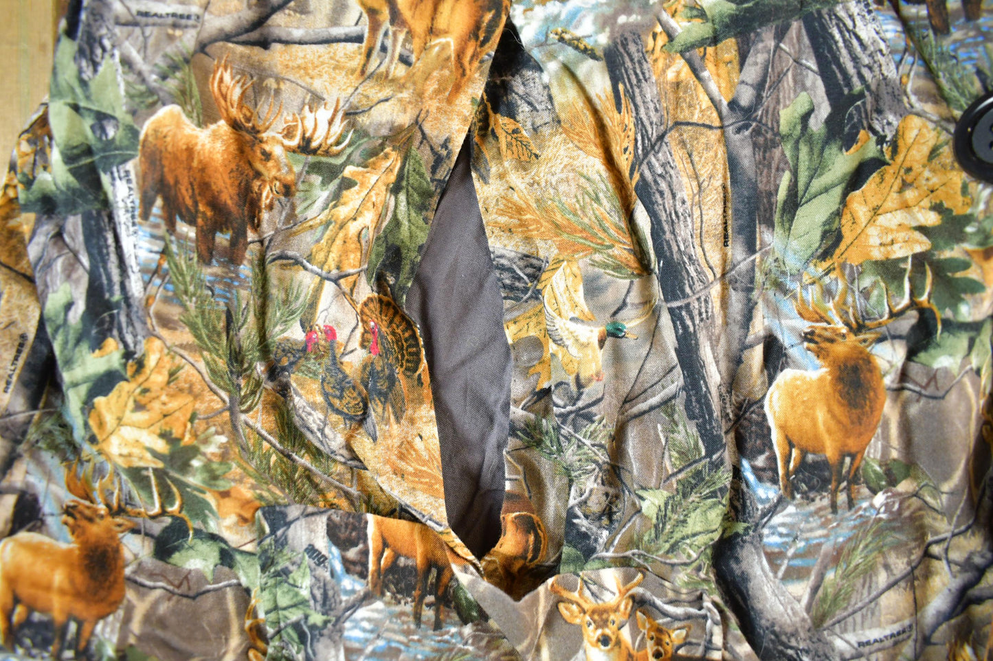 Vintage 1990s Realtree Camo Poncho Jacket Men's Medium from propervintagecanada