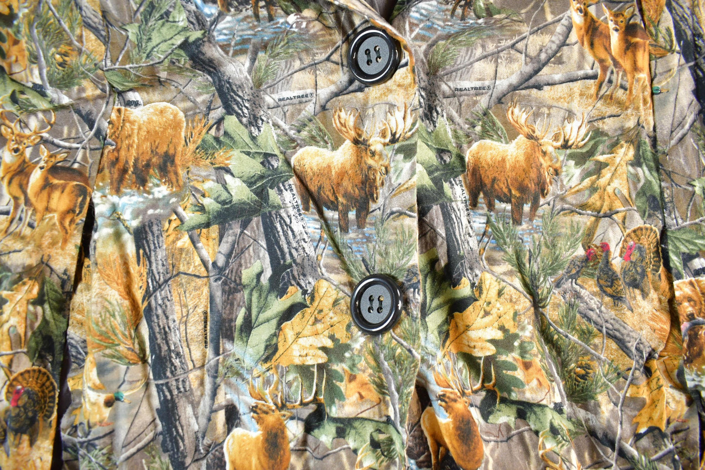 Vintage 1990s Realtree Camo Poncho Jacket Men's Medium from propervintagecanada