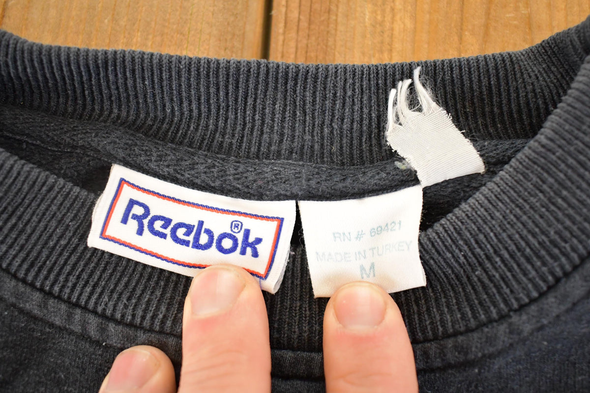 Vintage 1990s Reebok Big Logo Souvenir Crewneck Sweatshirt Mens M from propervintagecanada