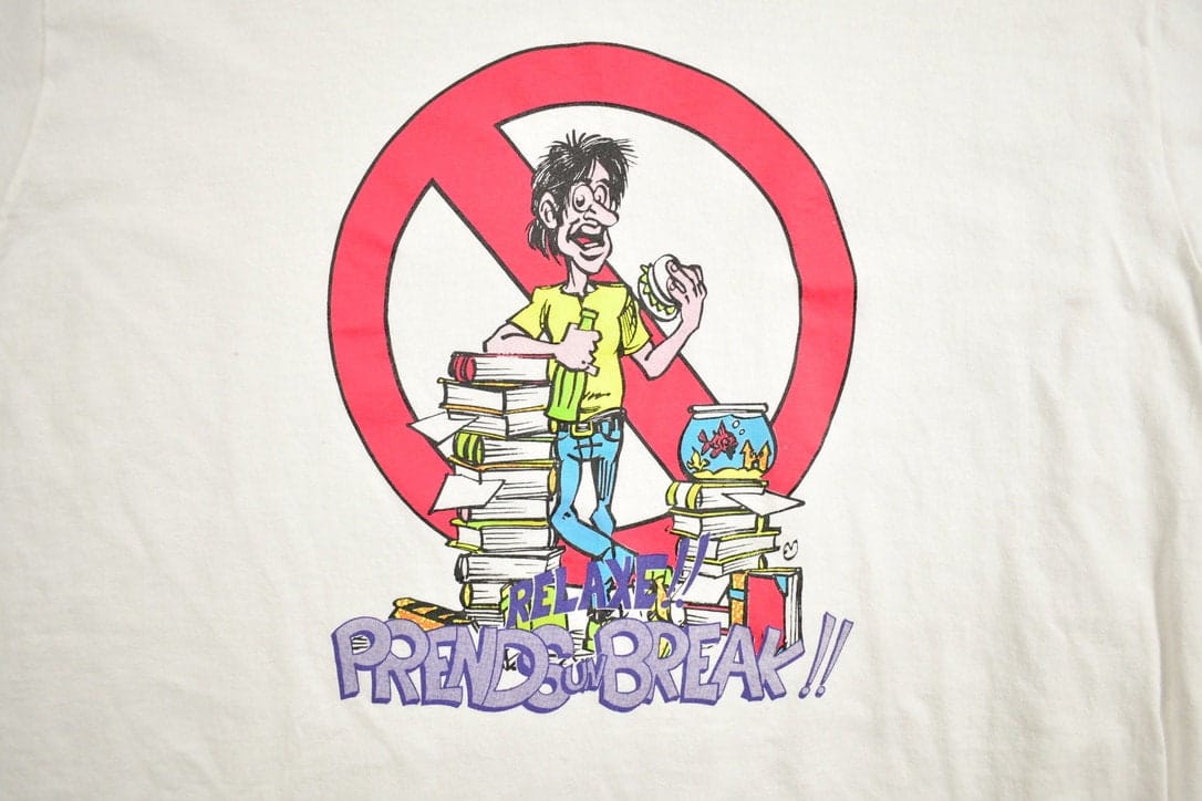 Vintage 1990s Relaxe Prends Un Break Graphic T-Shirt Men's Large from propervintagecanada
