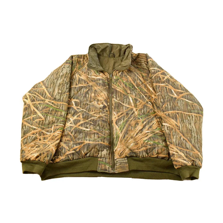 Vintage 1990s Remington Tree Camo Reversible Jacket Men's 2XL from propervintagecanada