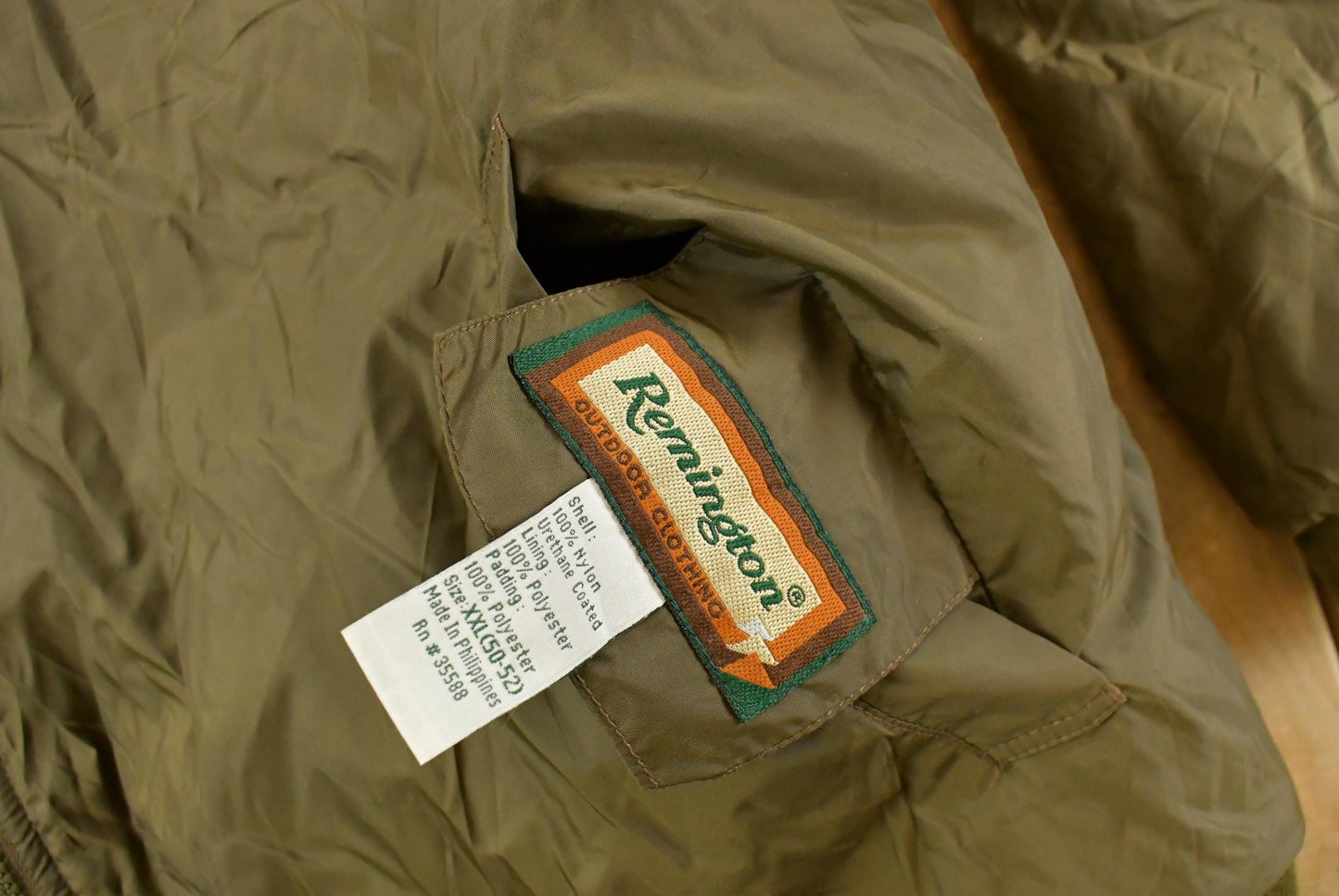Vintage 1990s Remington Tree Camo Reversible Jacket Men's 2XL from propervintagecanada