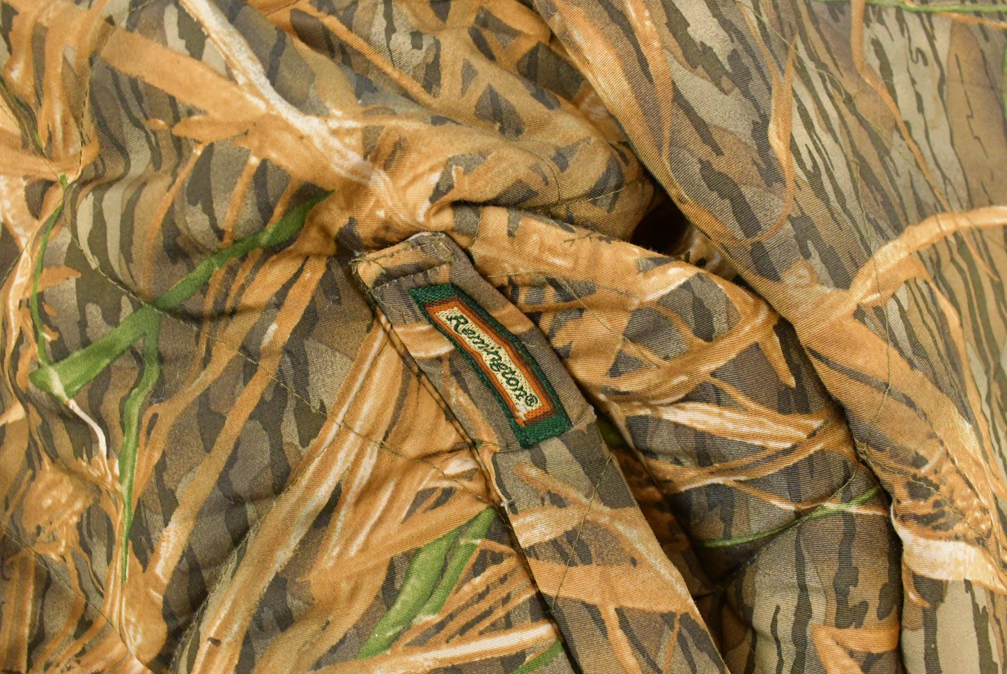 Vintage 1990s Remington Tree Camo Reversible Jacket Men's 2XL from propervintagecanada
