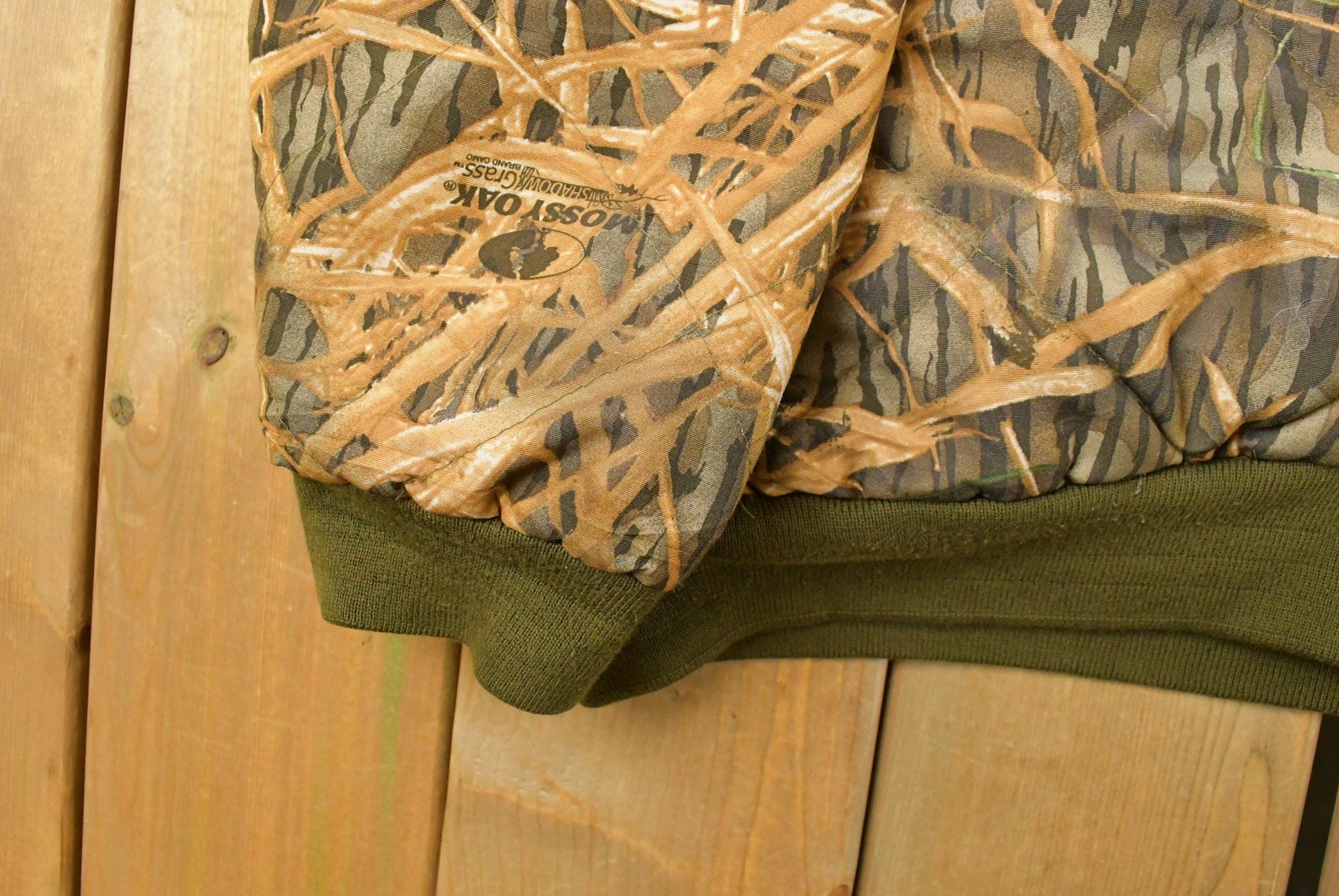 Vintage 1990s Remington Tree Camo Reversible Jacket Men's 2XL from propervintagecanada