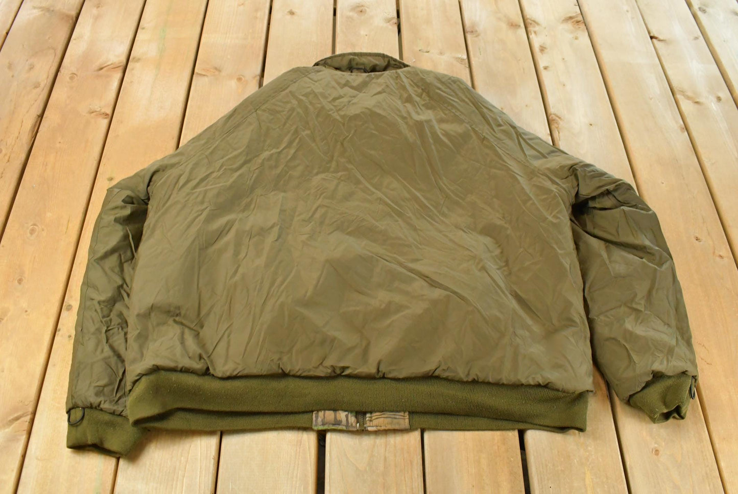 Vintage 1990s Remington Tree Camo Reversible Jacket Men's 2XL from propervintagecanada