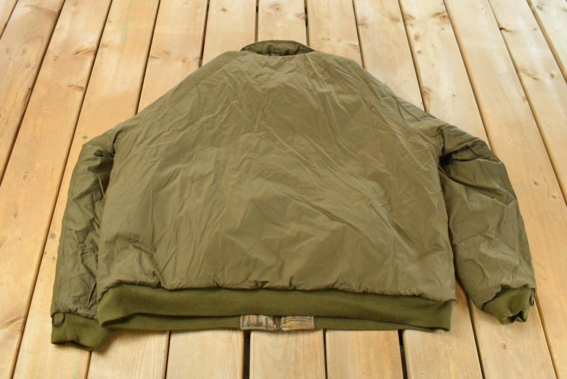 Vintage 1990s Remington Tree Camo Reversible Jacket Men's 2XL from propervintagecanada