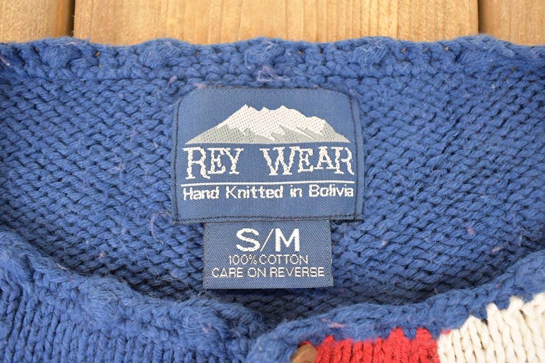 Vintage 1990s Rey Wear AOP American Flag Hand Knit Cardigan Sweater Womens S from propervintagecanada