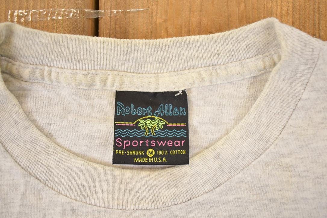 Vintage 1990s Robert Allen Lake Tahoe Ski Pups Souvenir Travel T-Shirt Men's M from propervintagecanada