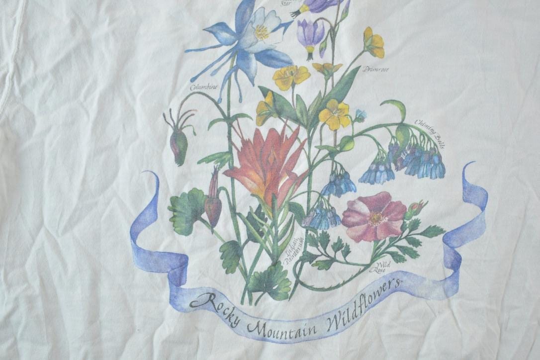 Vintage 1990s Rocky Mountain Wildflowers Souvenir Single Stitch Graphic Print T-Shirt Men's Medium from propervintagecanada