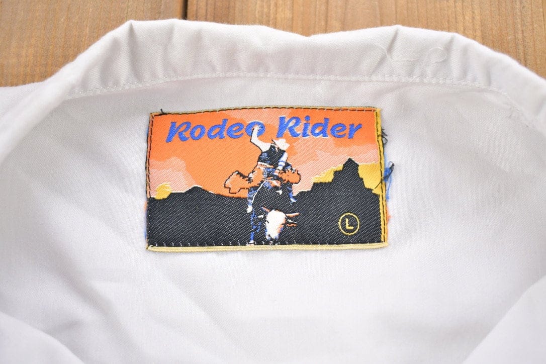 Vintage 1990s Rodeo Rider Button Up Shirt Men's Large from propervintagecanada
