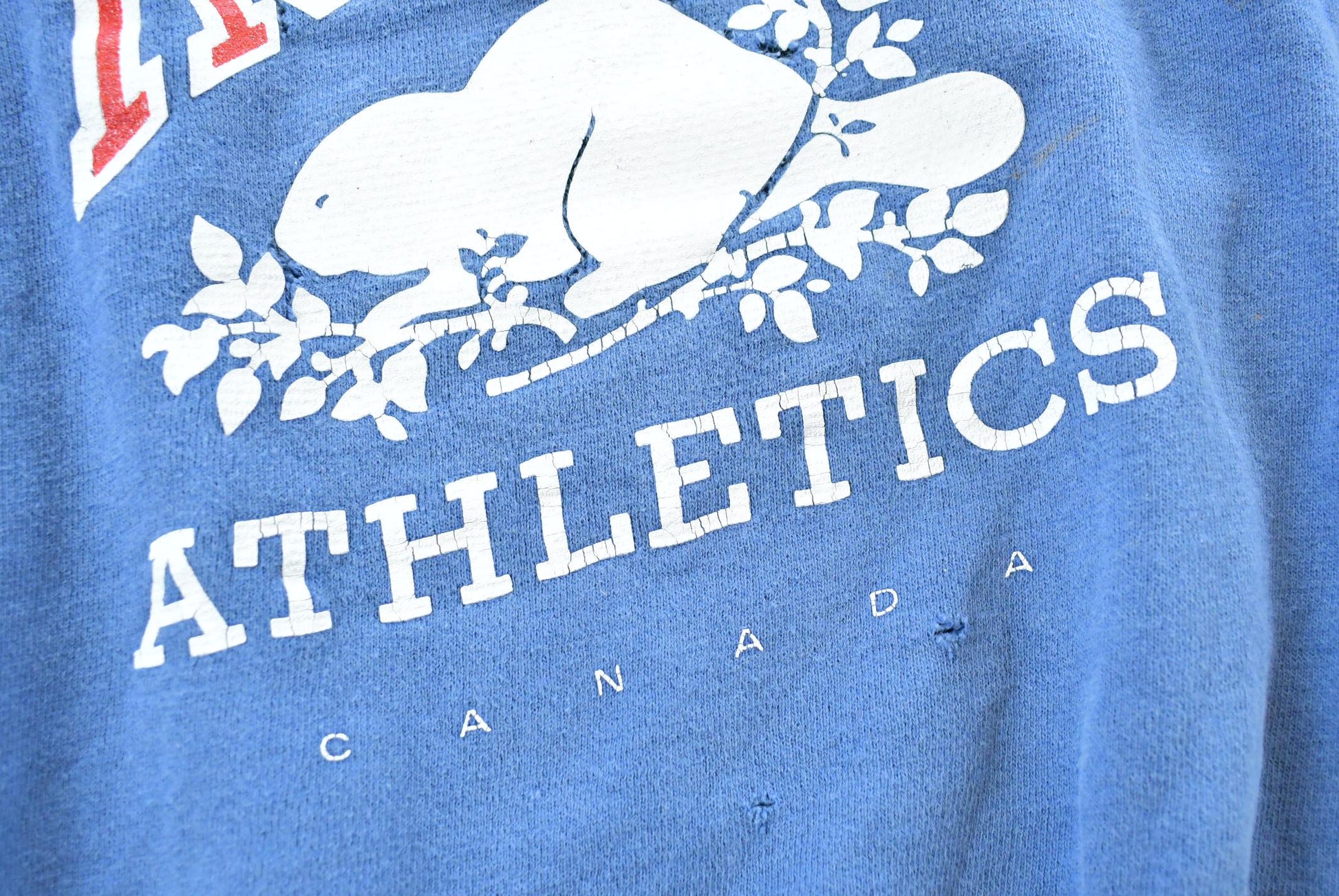 Vintage 1990s Roots Athletics Crewneck Sweatshirt Mens XL from propervintagecanada