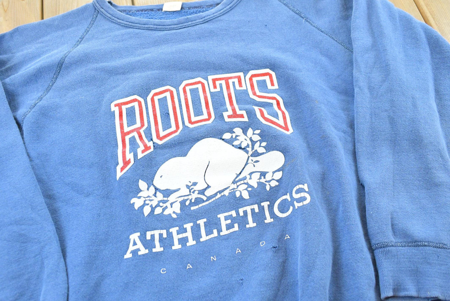 Vintage 1990s Roots Athletics Crewneck Sweatshirt Mens XL from propervintagecanada