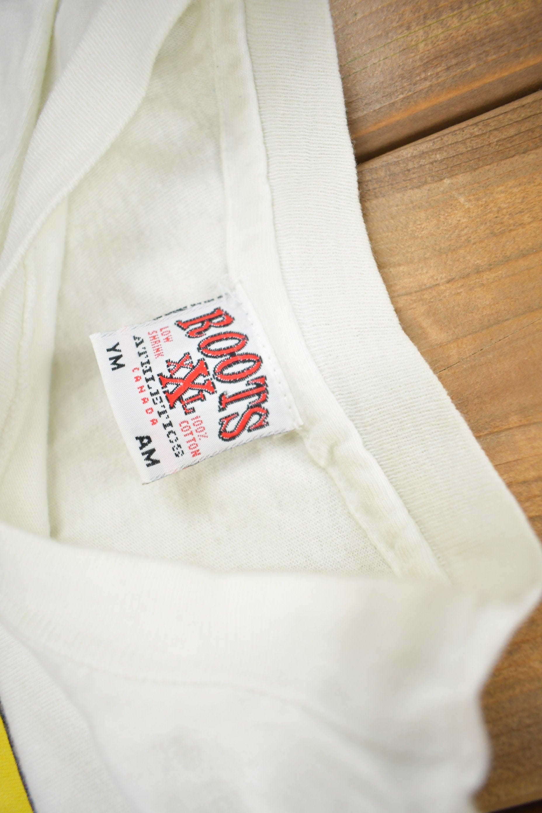 Vintage 1990s Roots Beaver Brand Graphic T-Shirt Youth XS Men's XS from propervintagecanada