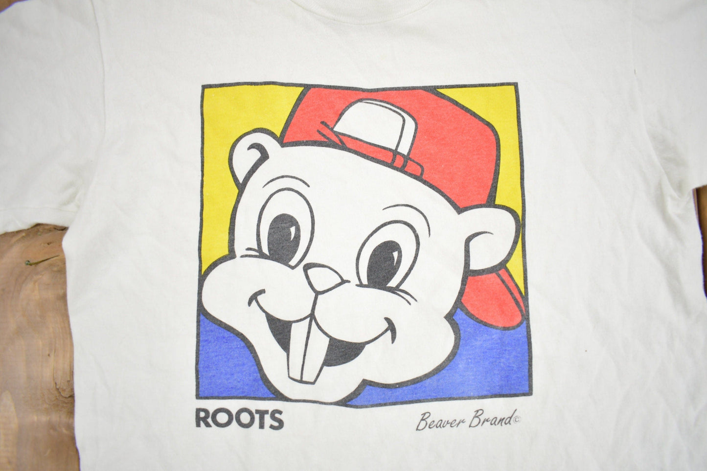 Vintage 1990s Roots Beaver Brand Graphic T-Shirt Youth XS Men's XS from propervintagecanada