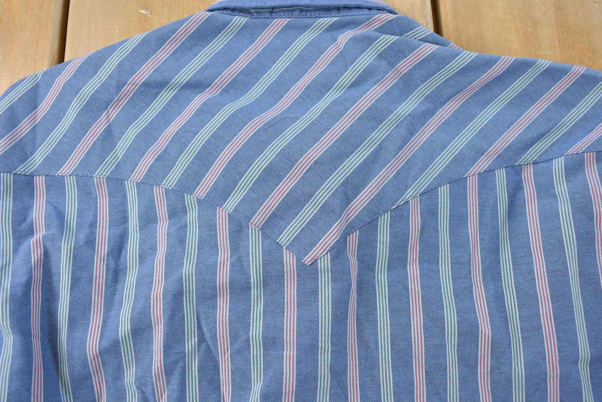 Vintage 1990s Ruddock Western Plaid Flannel Pearl Snap Shirt Men's L from propervintagecanada