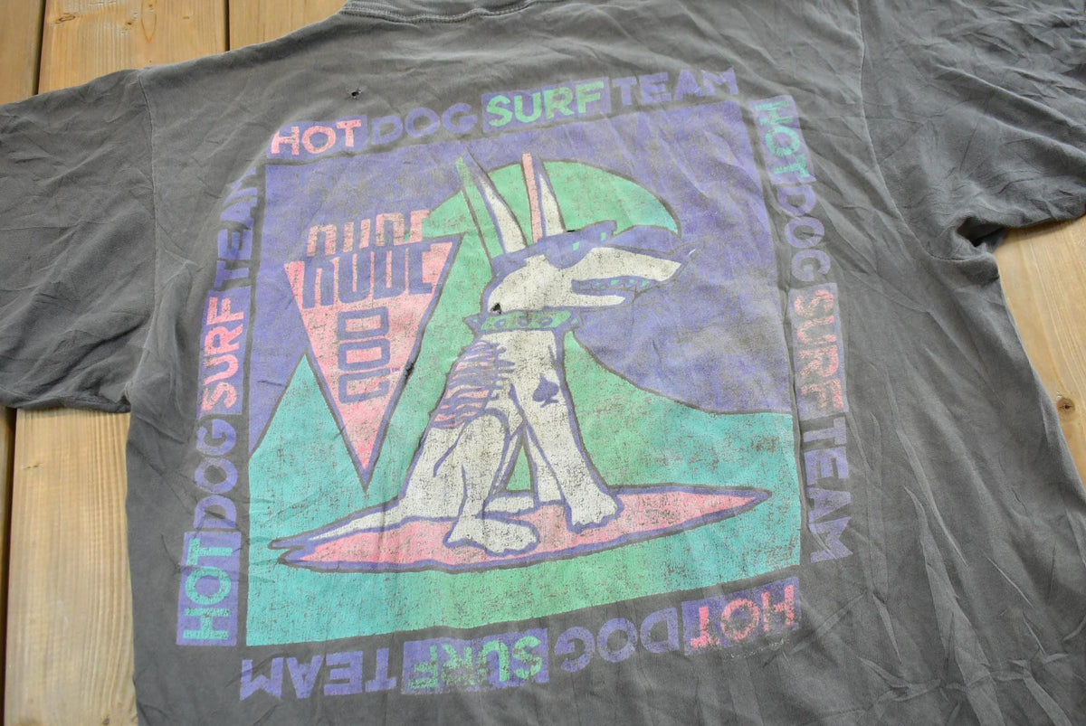 Vintage 1990s Rude Dog Hot Dog Surf Team T-Shirt Men's L from propervintagecanada