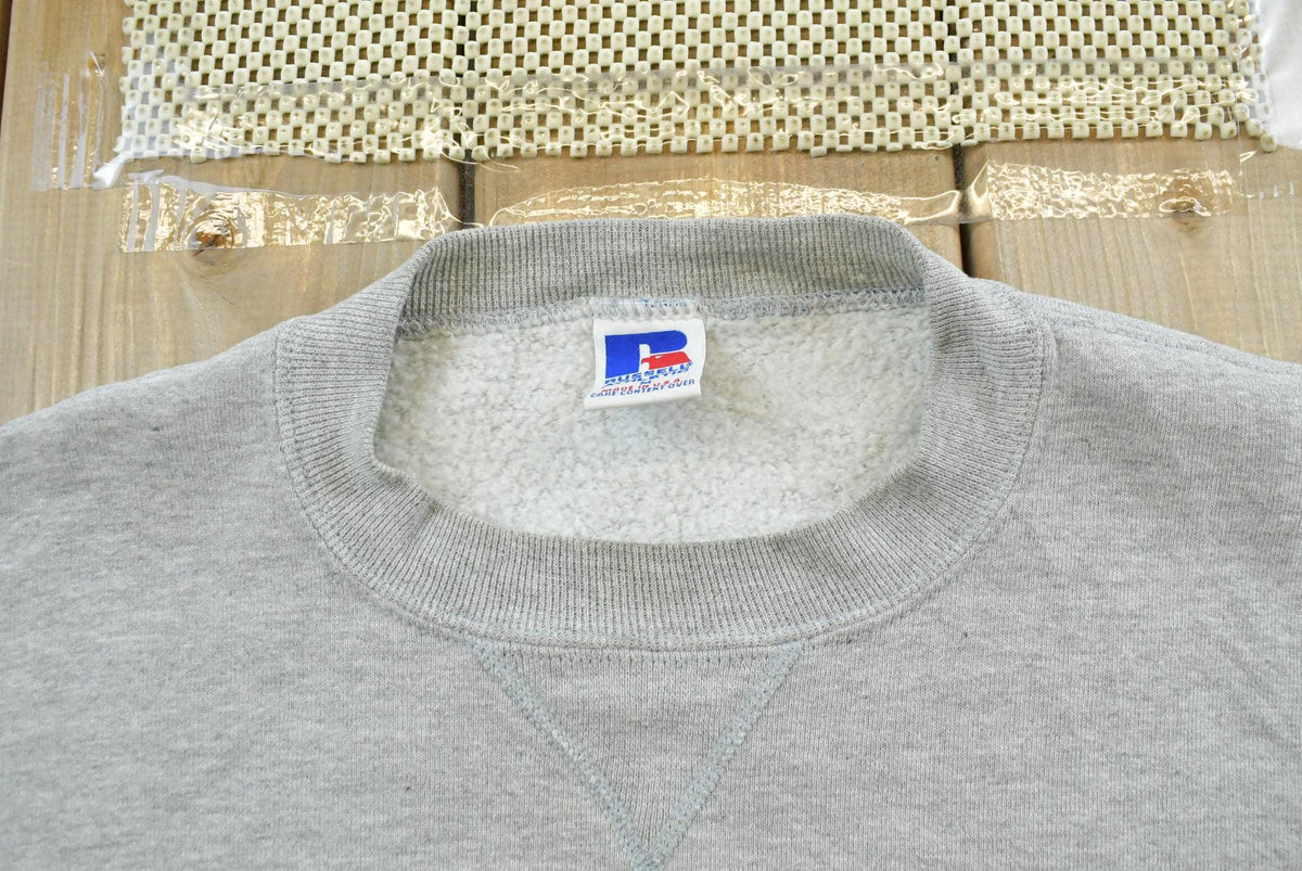Vintage 1990s Russell Athletic Connecticut Huskies University Embroidered Crewneck Men's M from propervintagecanada