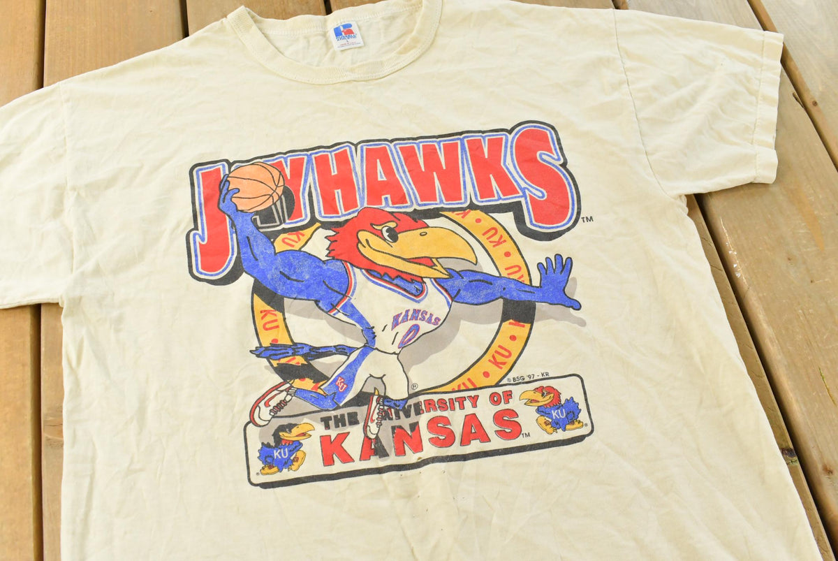 Vintage 1990s Russell Athletic NCAA Basketball University of Kansas Jayhawks Collegiate T-Shirt Men's L from propervintagecanada