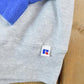 Vintage 1990s Russell Athletics Colour Block Graphic Hoodie Men's 2XL from propervintagecanada